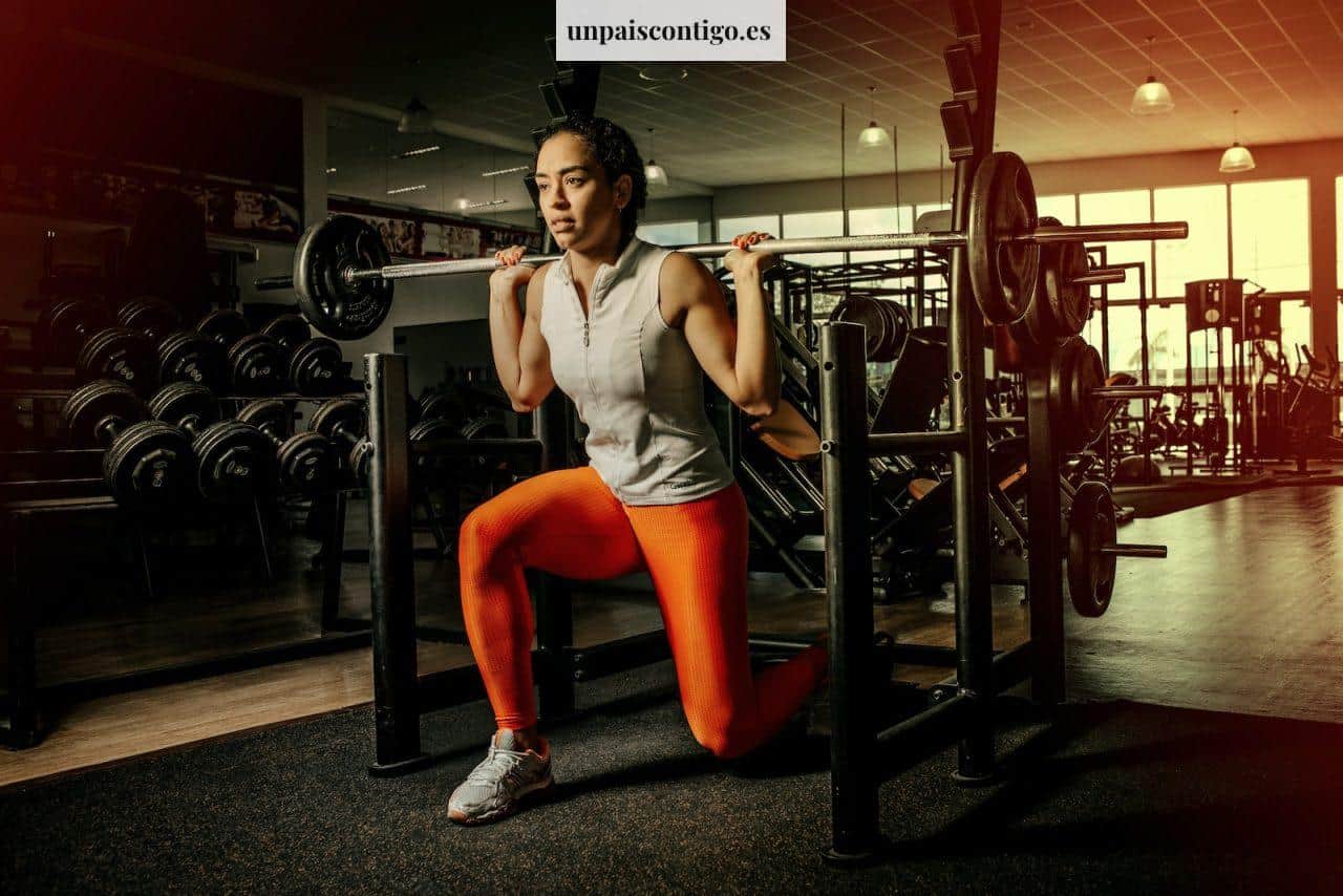 woman wearing gray shirt and orange leggings