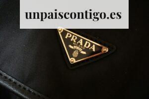 a prada logo on a black jacket