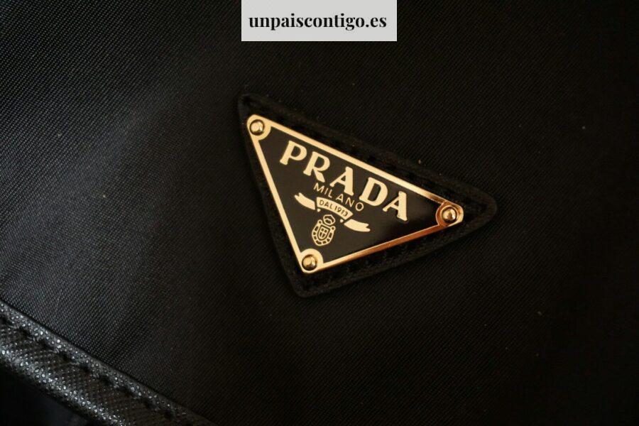 a prada logo on a black jacket